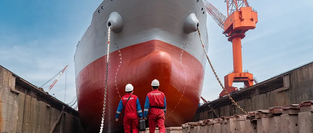 Coating inspectors approaching a vessel